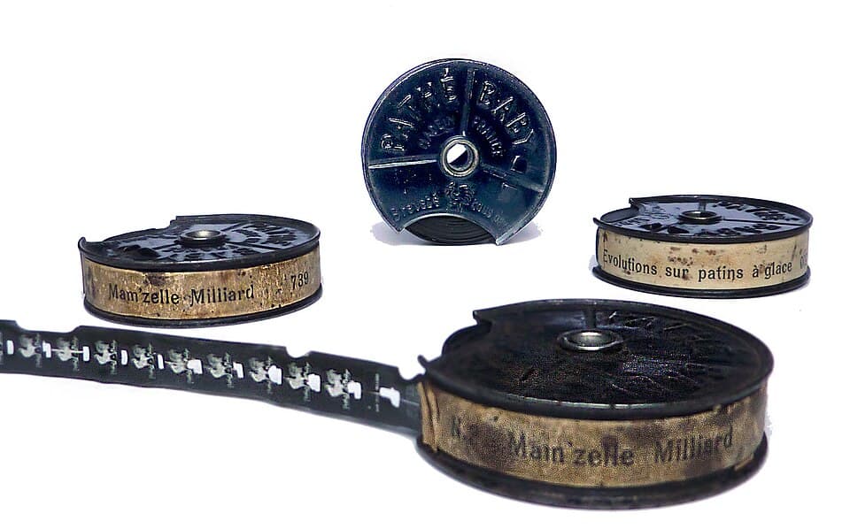 Pathé-Baby 9.5mm film reels with centre-perforated film